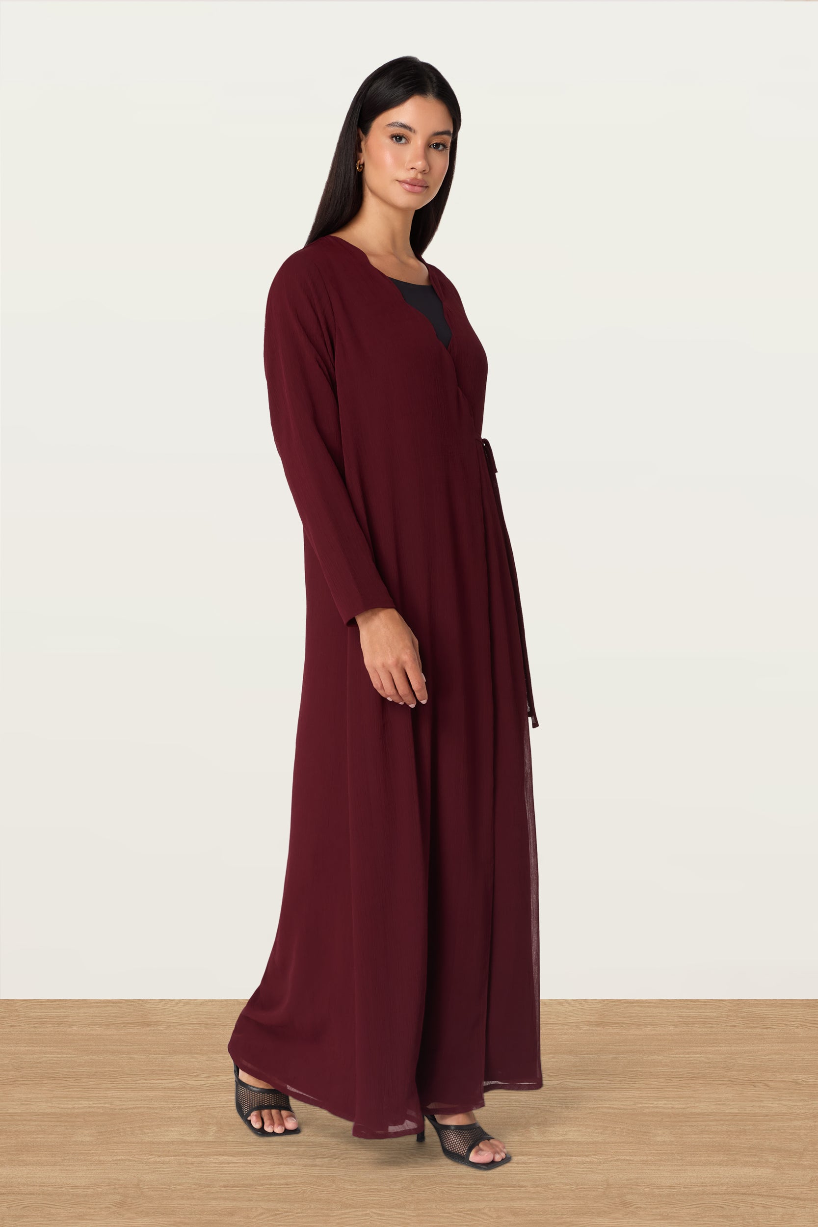 Manal in Maroon