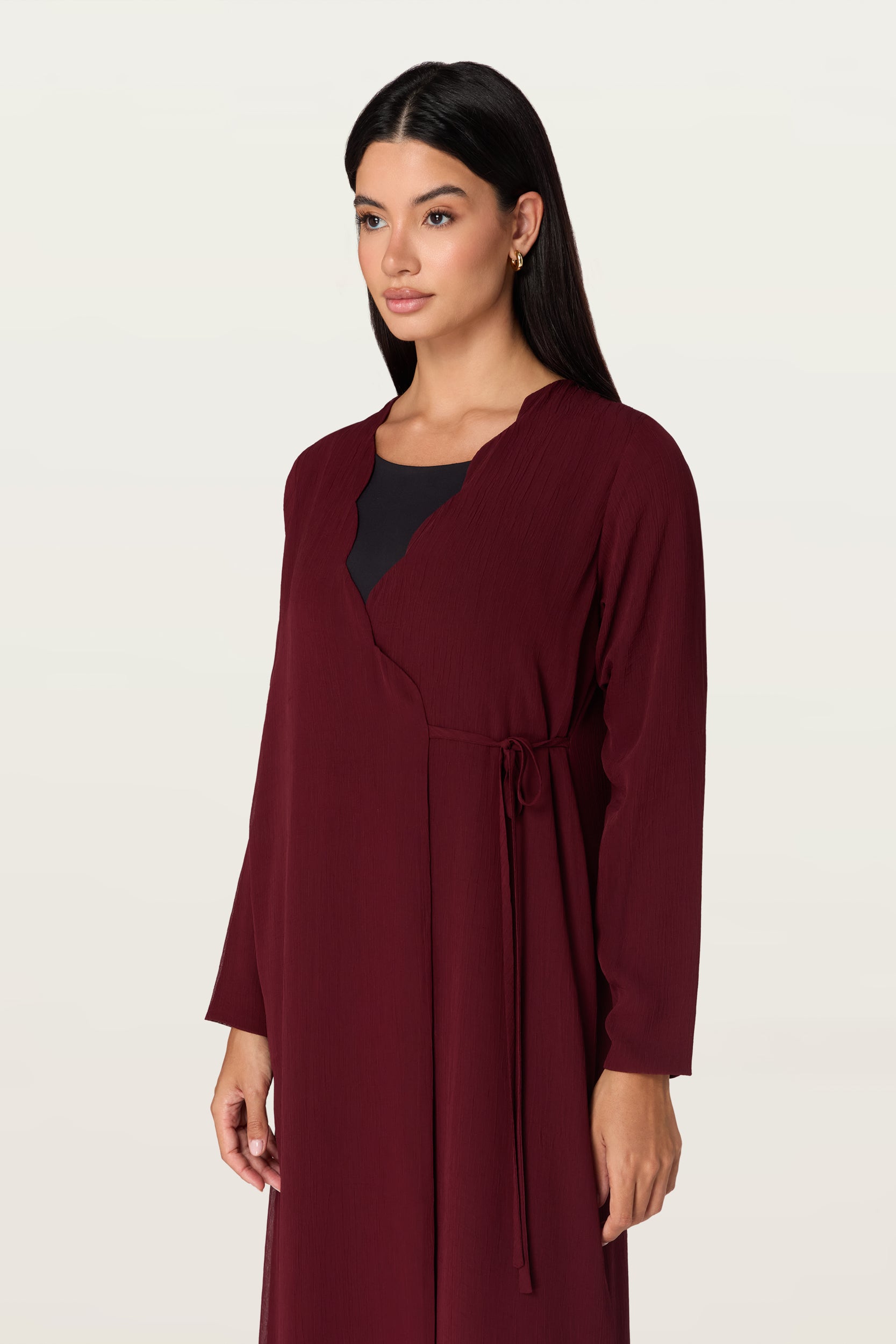 Manal in Maroon