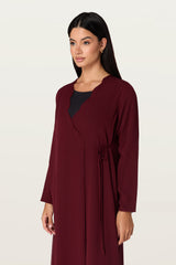 Manal in Maroon