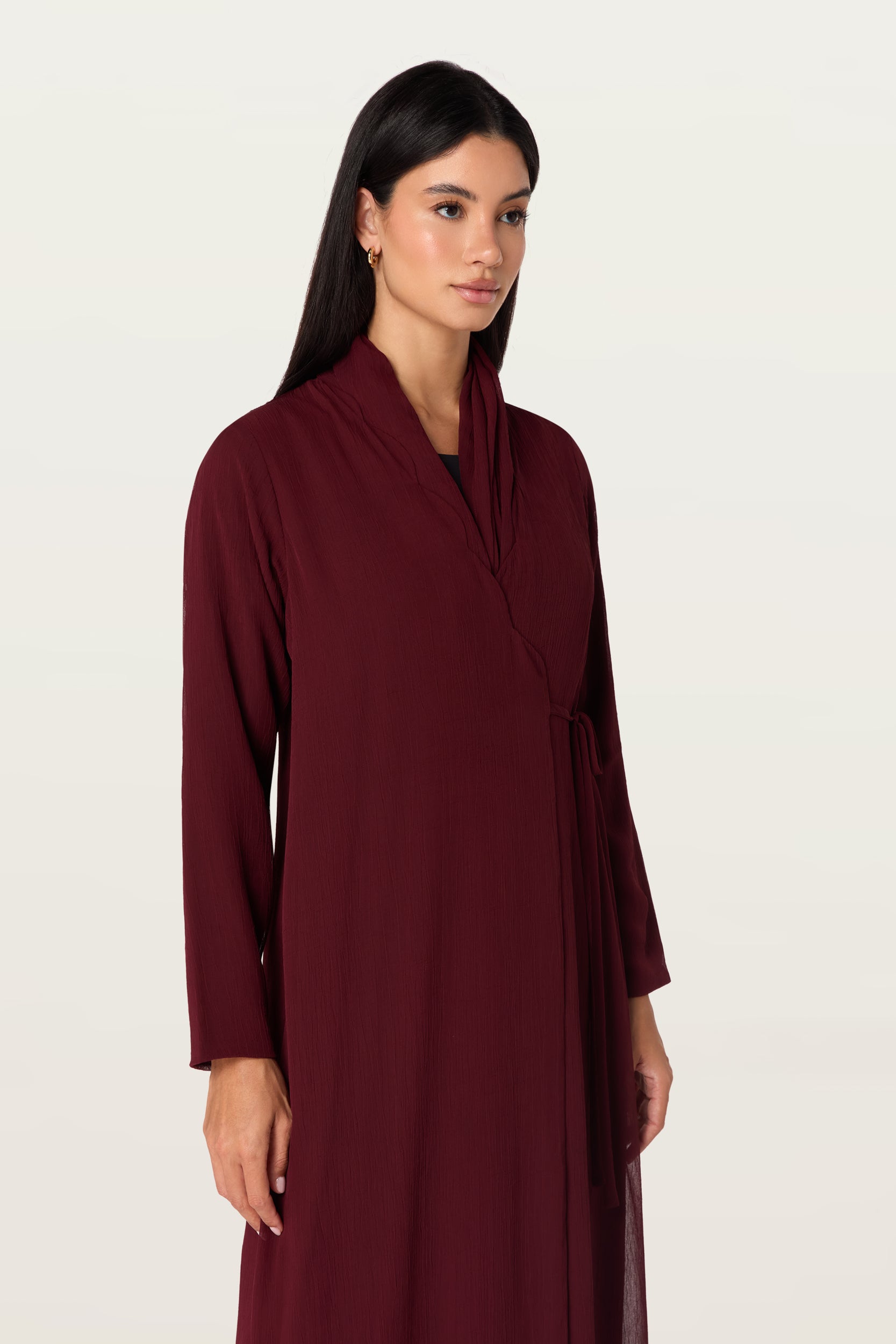 Manal in Maroon