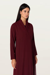 Manal in Maroon