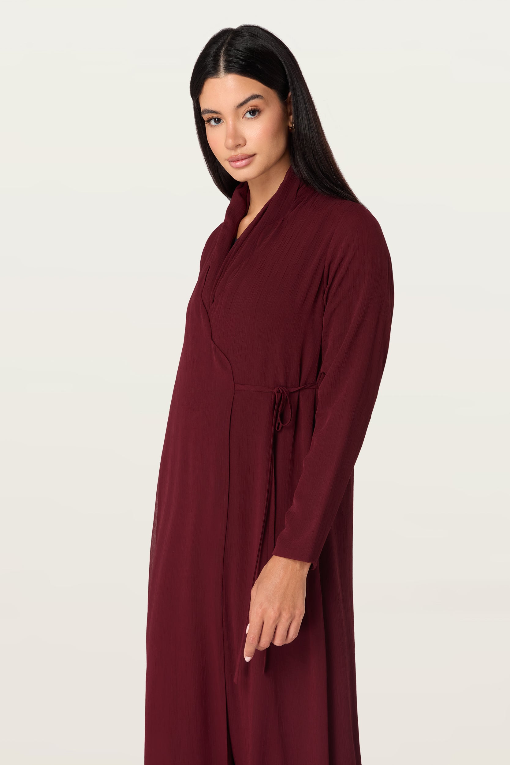 Manal in Maroon